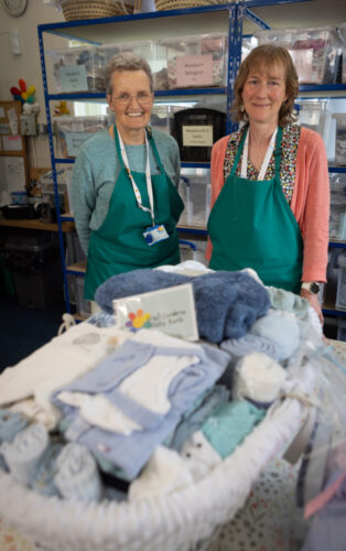 A photo of a basket with some volunteers